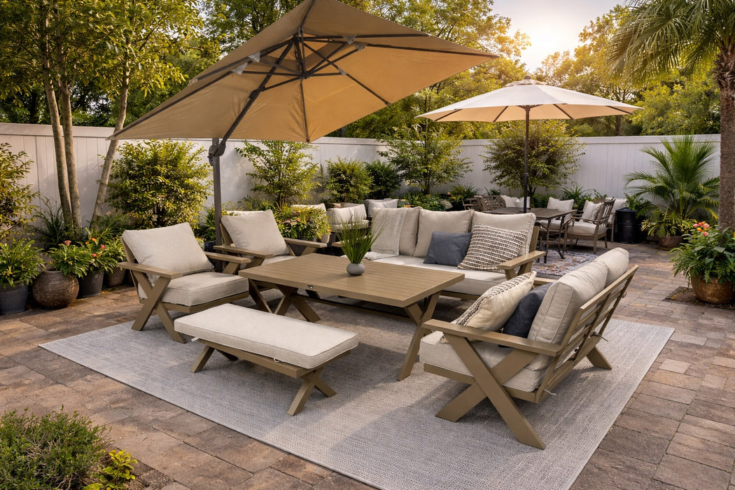 Gracie 6-piece aluminum outdoor dining and conversation set in a landscaped backyard