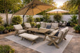 Gracie 6-piece aluminum outdoor dining and conversation set in a landscaped backyard